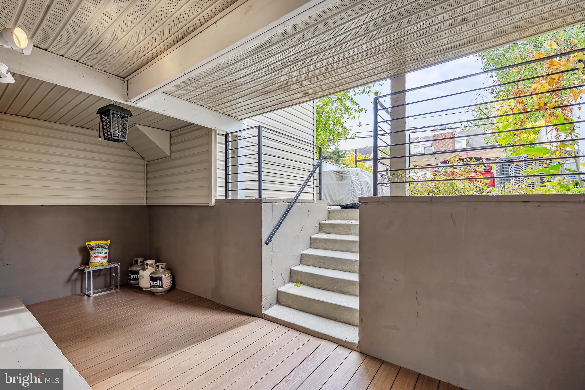 2616 Garfield Street Northwest, Unit 1 Washington, DC 20008 - Photo 18 of 22 a view of a livingroom with wooden floor and furniture