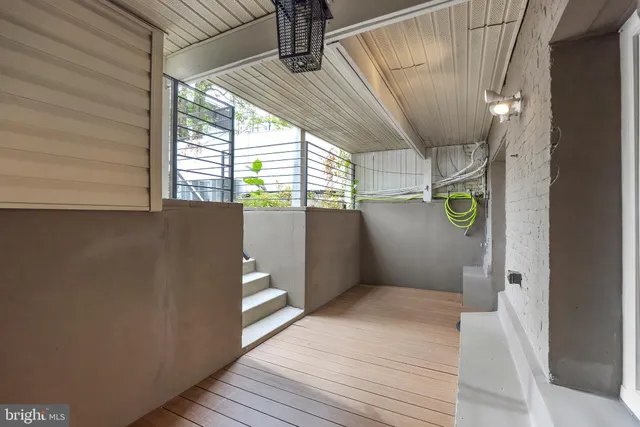 a view of a backyard with a car parked in a yard