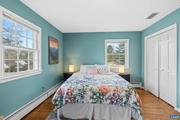 a bathroom with a shower and a toilet