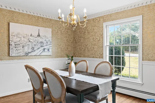 a bedroom with a bed and couch