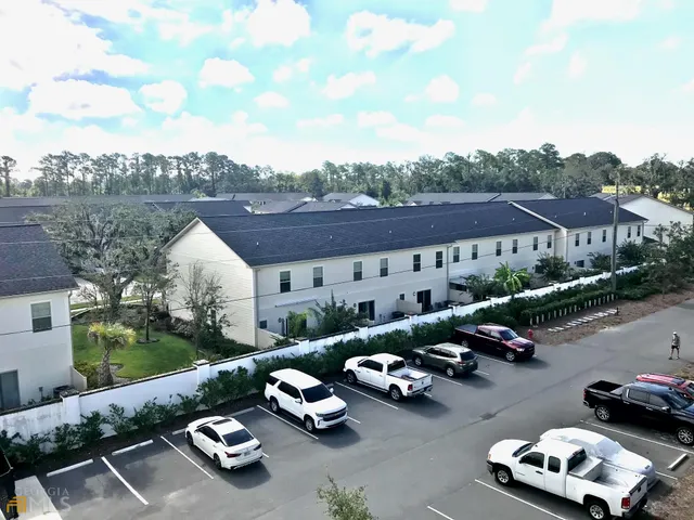 a car parked beside a road next to a road