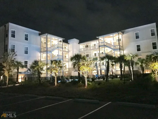 a view of swimming pool with outdoor seating