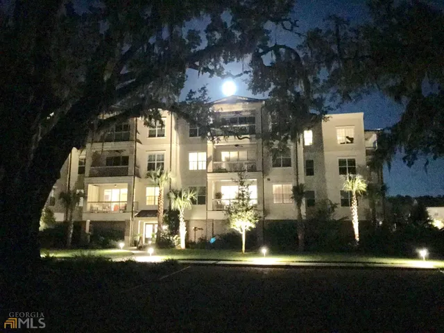 a view of car parked in front of building