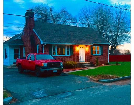 140 Nagle Street Springfield, MA 01151 - Photo 1 of 22 a front view of a house with garden
