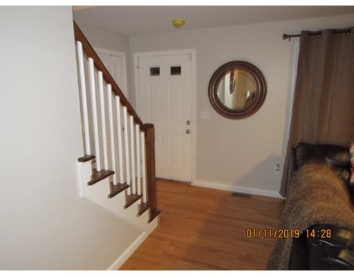 140 Nagle Street Springfield, MA 01151 - Photo 11 of 22 a view of a livingroom with furniture and staircase