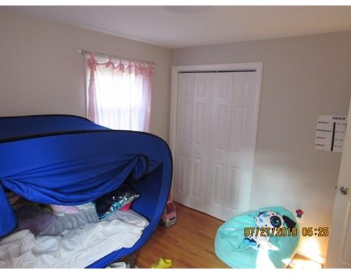 140 Nagle Street Springfield, MA 01151 - Photo 13 of 22 a room with a bed and a window
