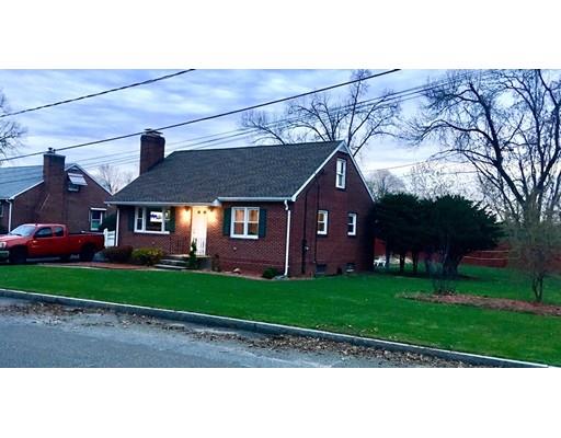 140 Nagle Street Springfield, MA 01151 - Photo 2 of 22 a front view of a house with a yard