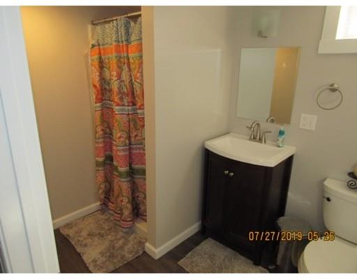 140 Nagle Street Springfield, MA 01151 - Photo 21 of 22 a bathroom with a sink and a mirror