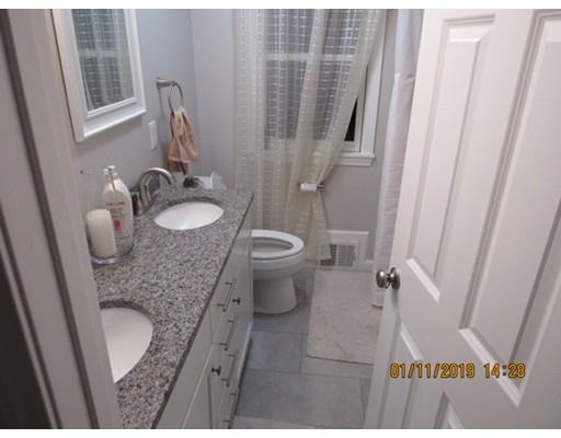 140 Nagle Street Springfield, MA 01151 - Photo 9 of 22 a bathroom with a granite countertop sink toilet and shower