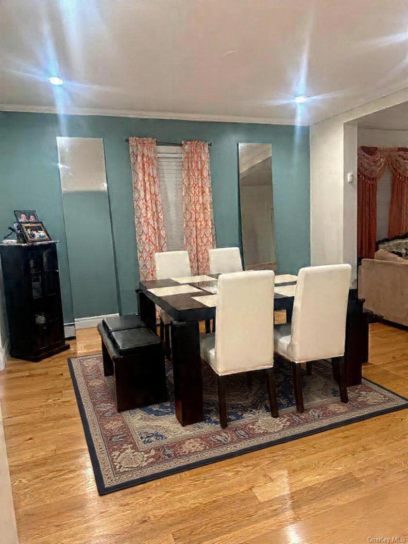 194-56 114th Road Queens, NY 11412 - Photo 6 of 16 a view of a dining room with furniture