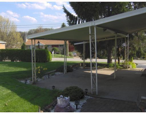 985 North Whitmore Road North Huntingdon, PA 15642 - Photo 3 of 11 Patio/Deck. 18X18 Covered Concrete Patio