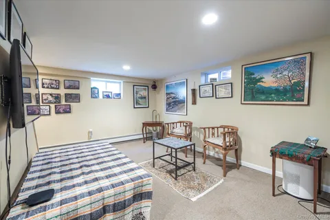 a bedroom with furniture and a bed