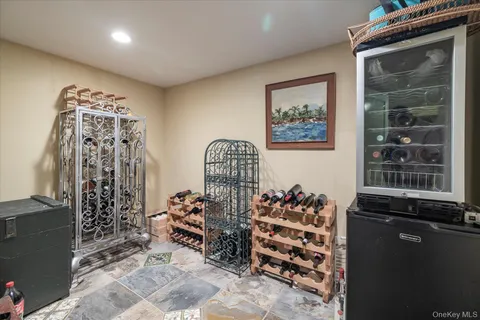 a view of a room with lots of stuff and hardwood floor