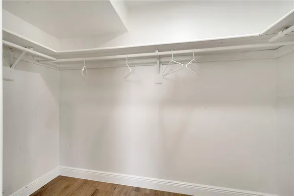 a view of a room with shelf on the wall