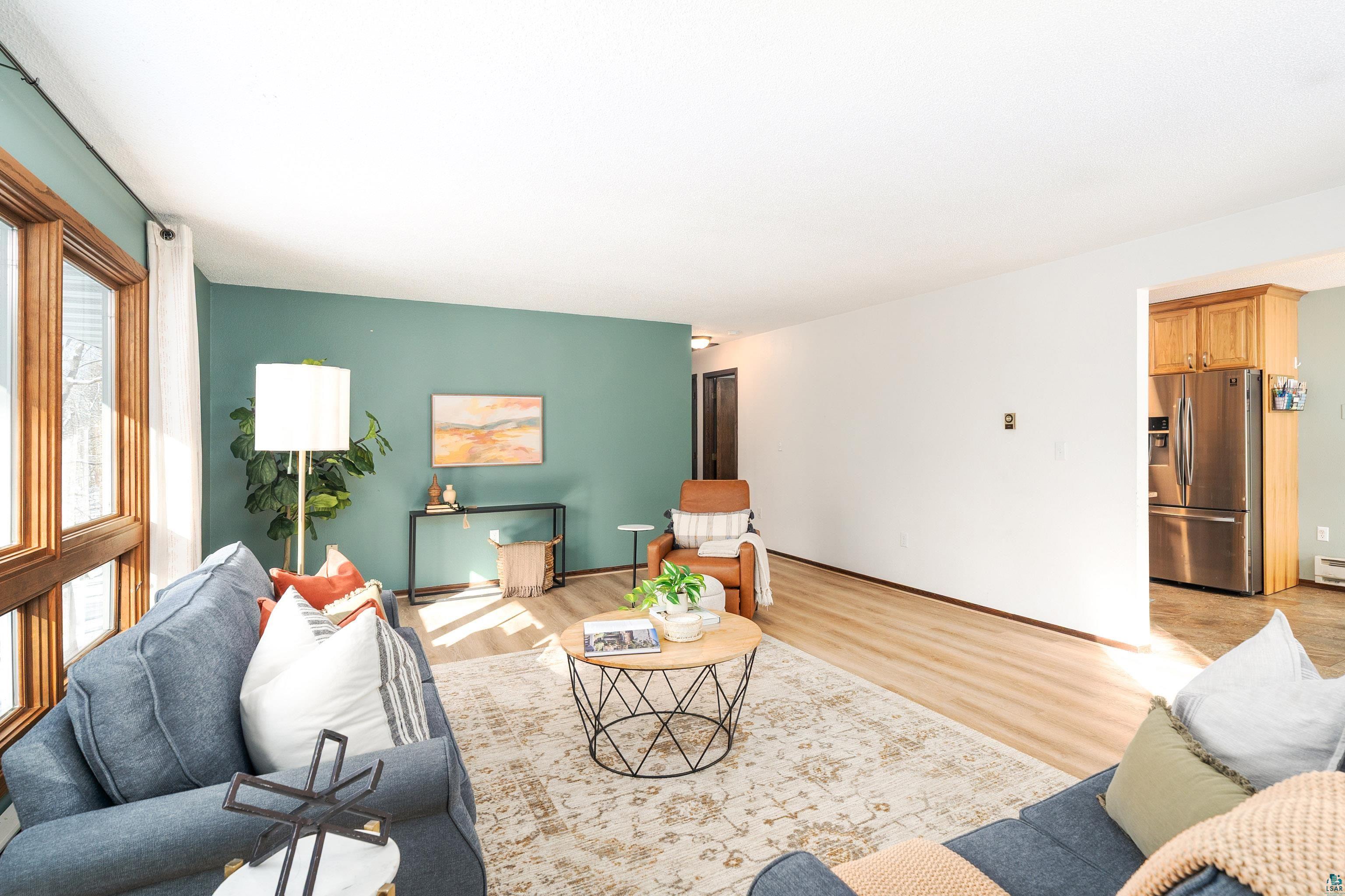 5947 East St Louis River Road Proctor, MN 55810 - Photo 16 of 47 Living room with light wood-type flooring