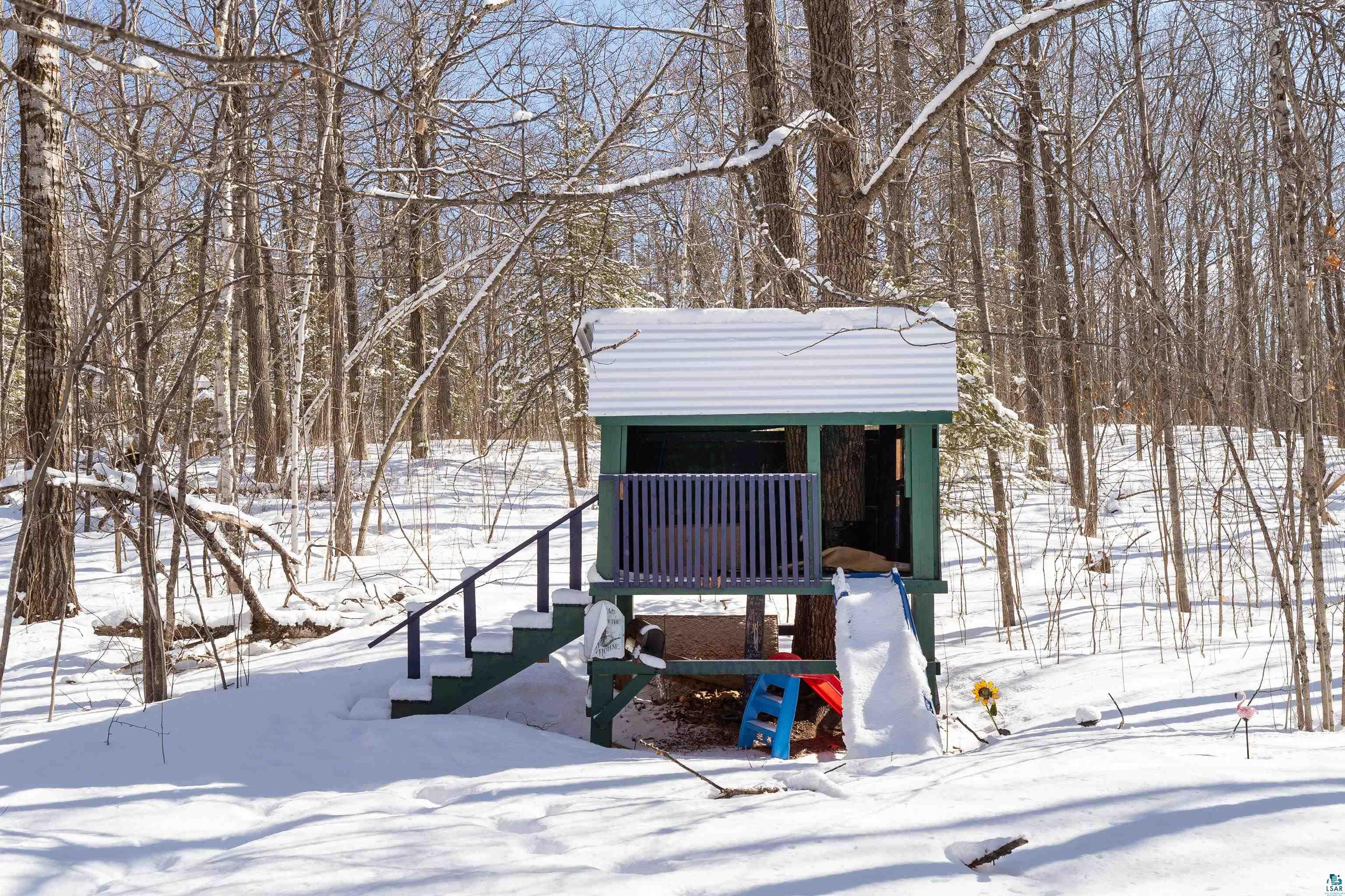 5947 East St Louis River Road Proctor, MN 55810 - Photo 36 of 47 Snow covered structure with a playground