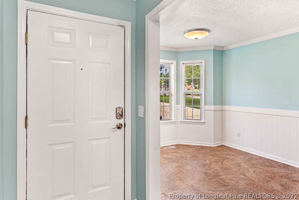 495 Sawyer Road Cameron, NC 28326 - Photo 16 of 33 an empty room with windows