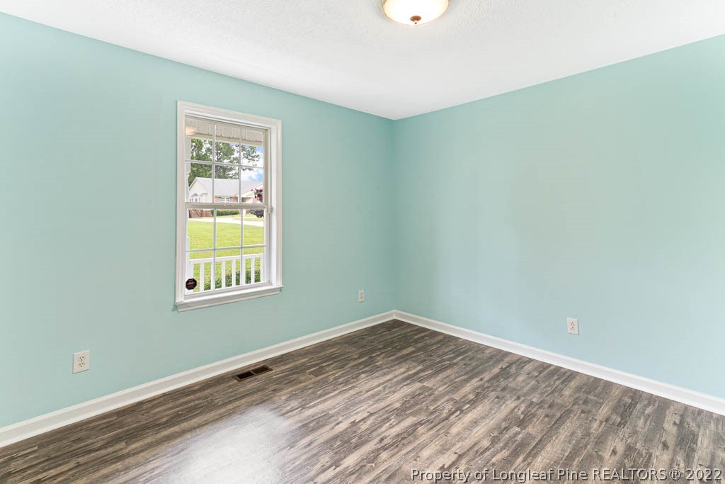 495 Sawyer Road Cameron, NC 28326 - Photo 19 of 33 an empty room with a window