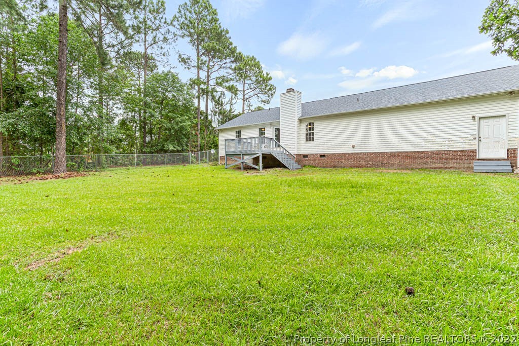 495 Sawyer Road Cameron, NC 28326 - Photo 31 of 33 a view of a patio with a garden and entertaining space