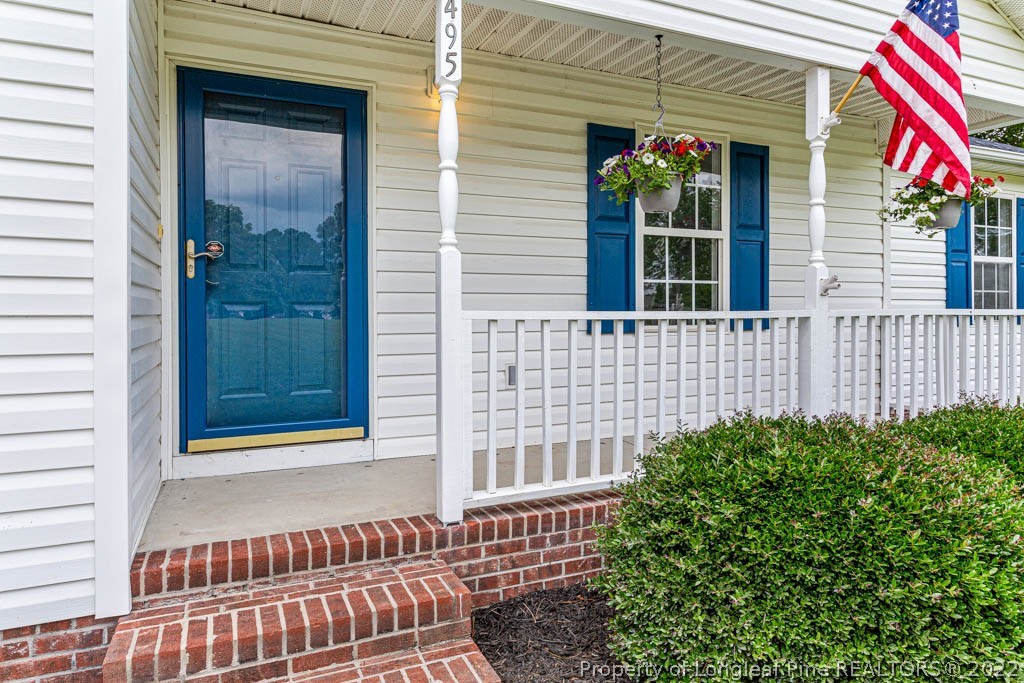 495 Sawyer Road Cameron, NC 28326 - Photo 4 of 33 a view of a house with a door and wooden floor