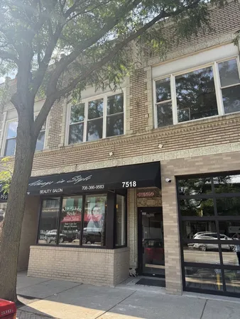 a view of a building with that has a tree