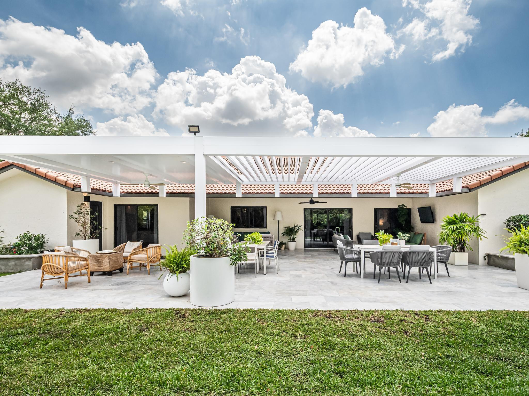 17451 Southwest 46th Street Southwest Ranches, FL 33331 - Photo 14 of 48 a view of a patio with couches table and chairs