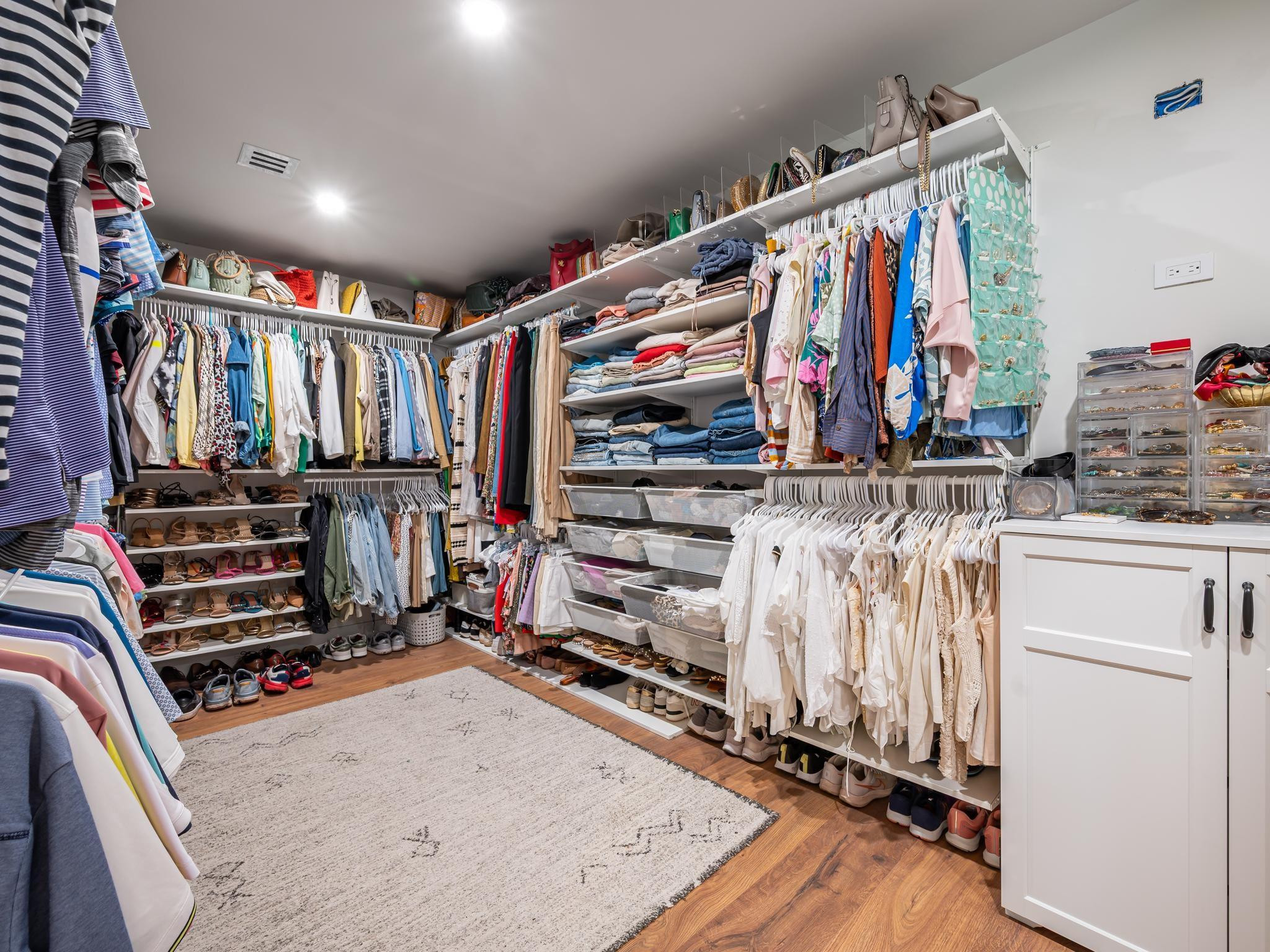 17451 Southwest 46th Street Southwest Ranches, FL 33331 - Photo 24 of 48 a view of walk in closet with clothes and shoes
