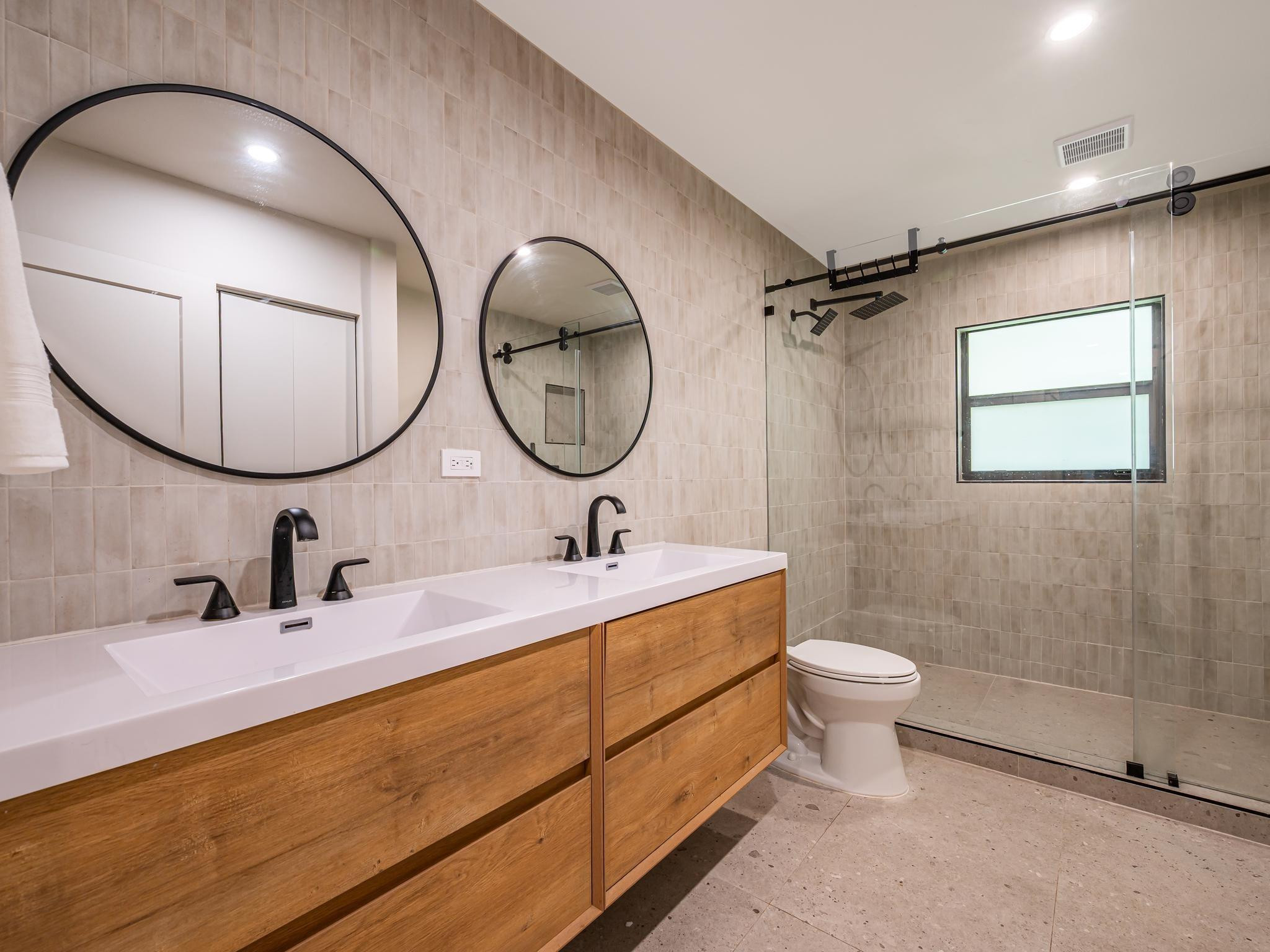 17451 Southwest 46th Street Southwest Ranches, FL 33331 - Photo 29 of 48 a bathroom with a double vanity sink mirror and toilet