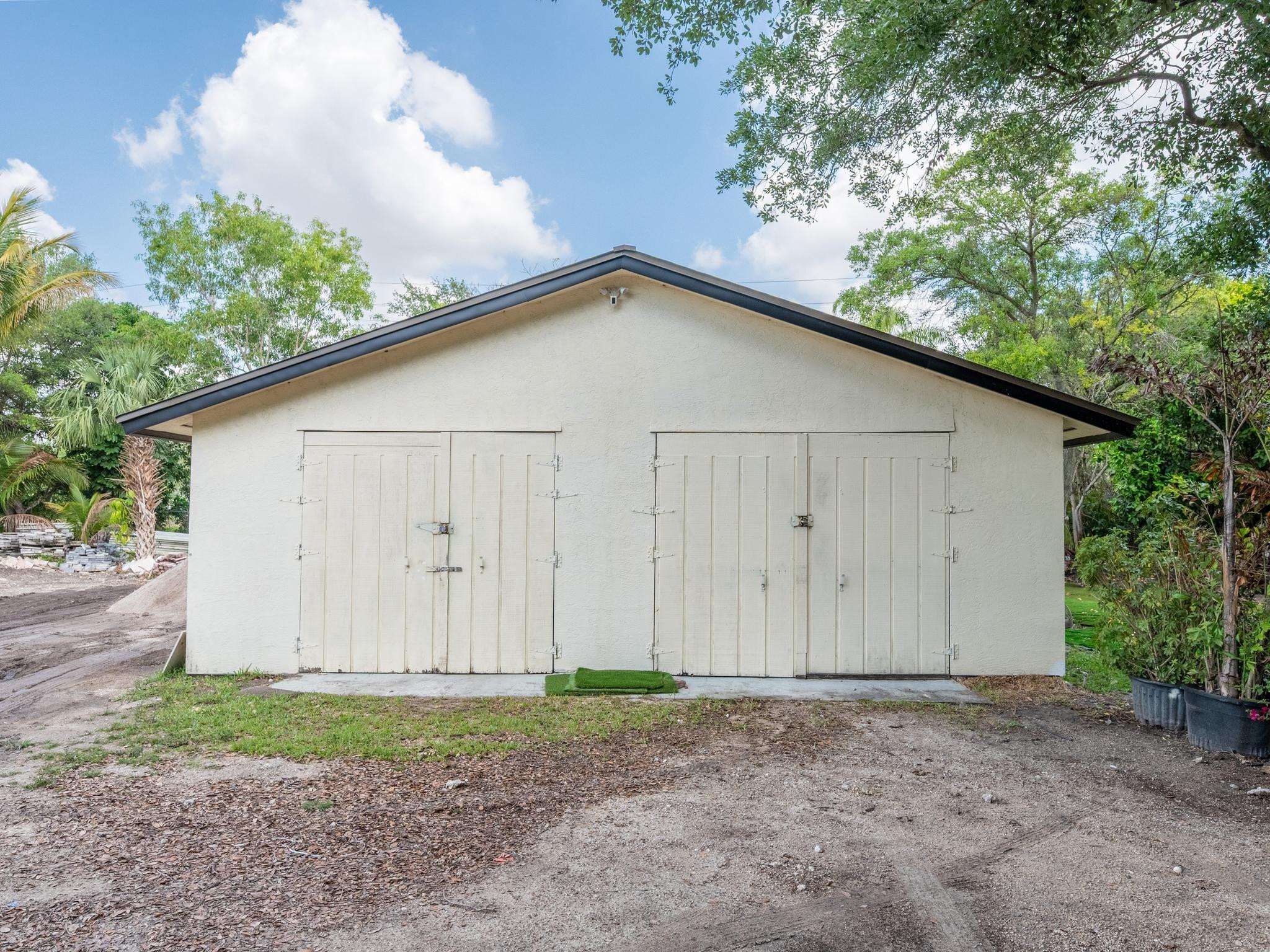 17451 Southwest 46th Street Southwest Ranches, FL 33331 - Photo 35 of 48 a view of a backyard