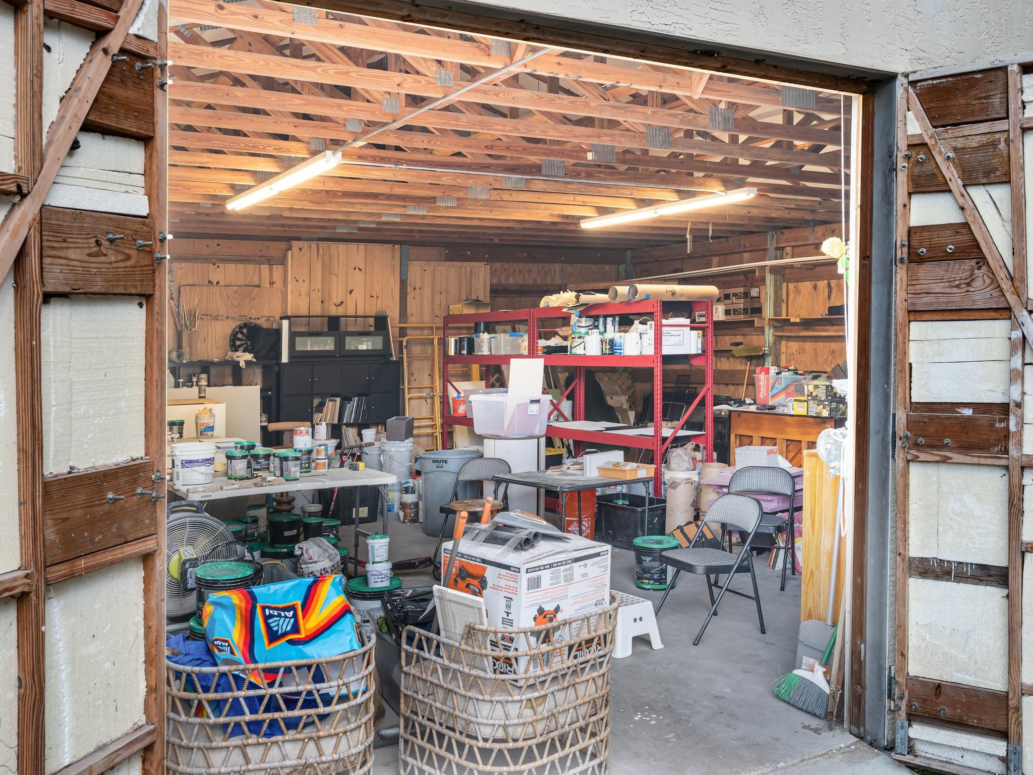 17451 Southwest 46th Street Southwest Ranches, FL 33331 - Photo 36 of 48 a store room with lots of furniture and clutter