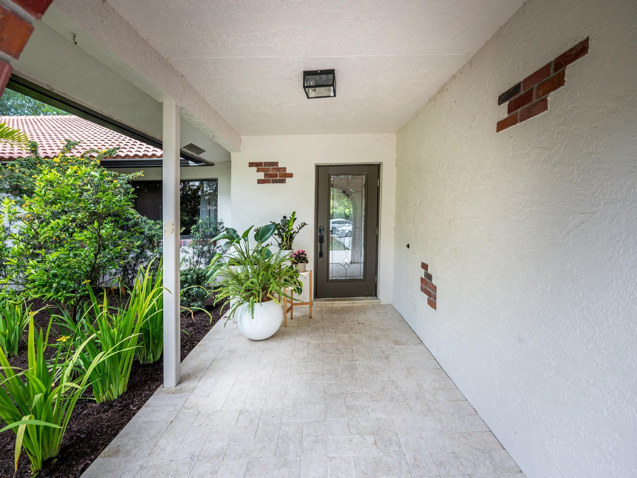 17451 Southwest 46th Street Southwest Ranches, FL 33331 - Photo 39 of 48 an empty room with windows and garden