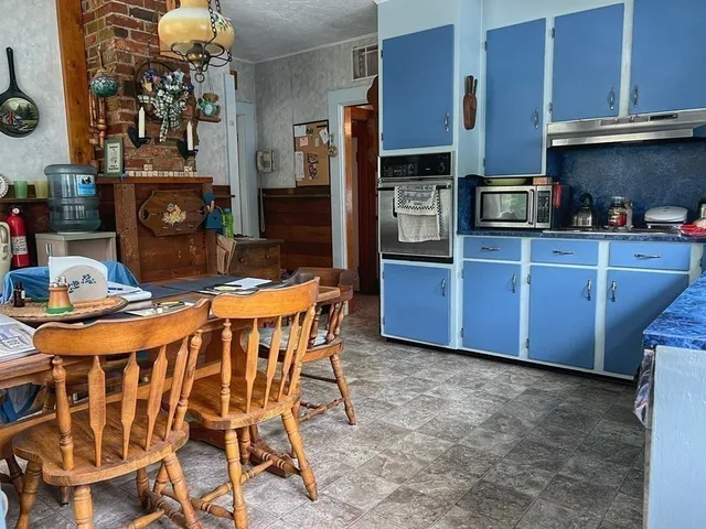 a table and chairs in a kitchen