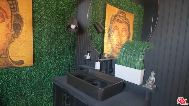 a view of a couches and table in patio