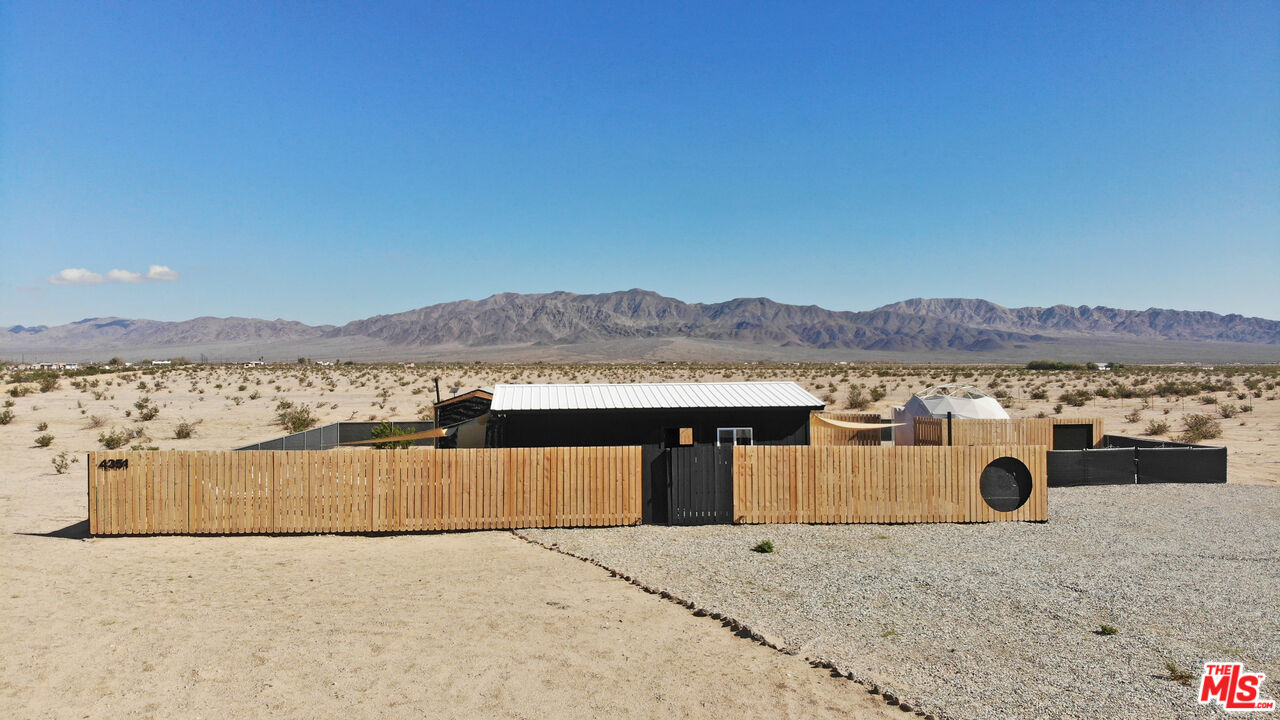 4351 Meriwether Road Twentynine Palms, CA 92277 - Photo 27 of 28 a view of a terrace with a mountain