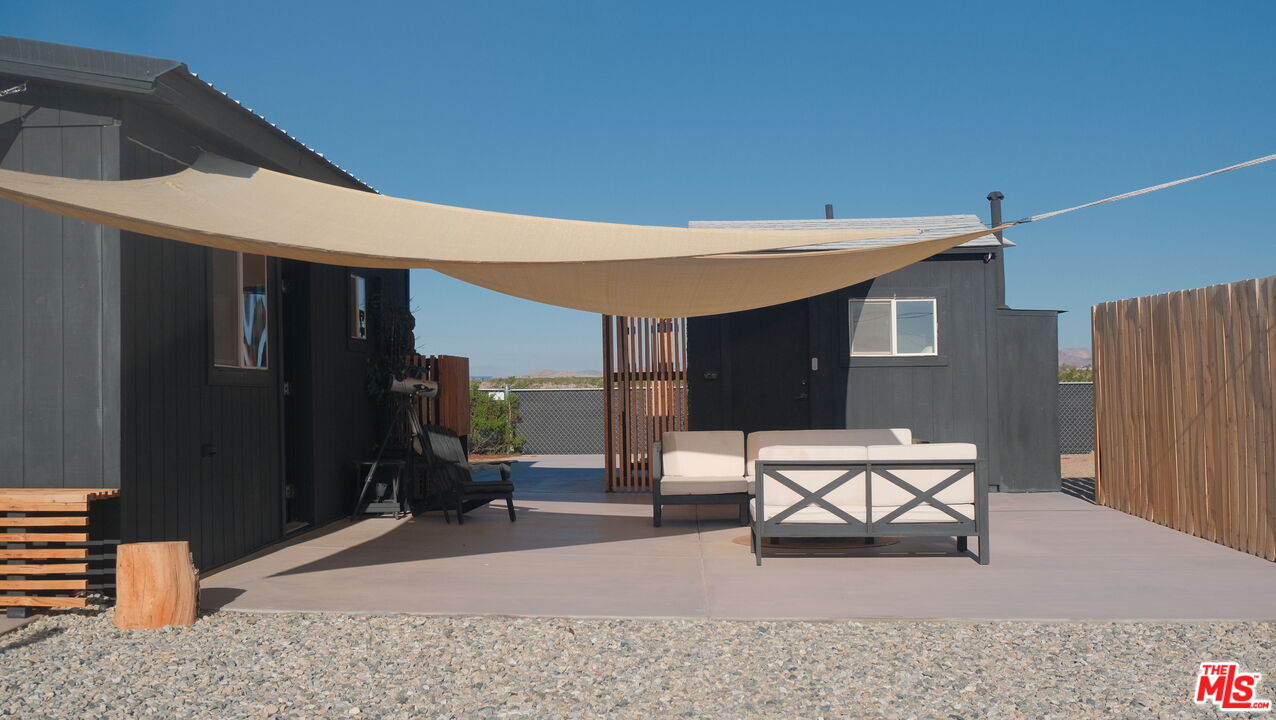 4351 Meriwether Road Twentynine Palms, CA 92277 - Photo 28 of 28 a building outdoor space with patio furniture