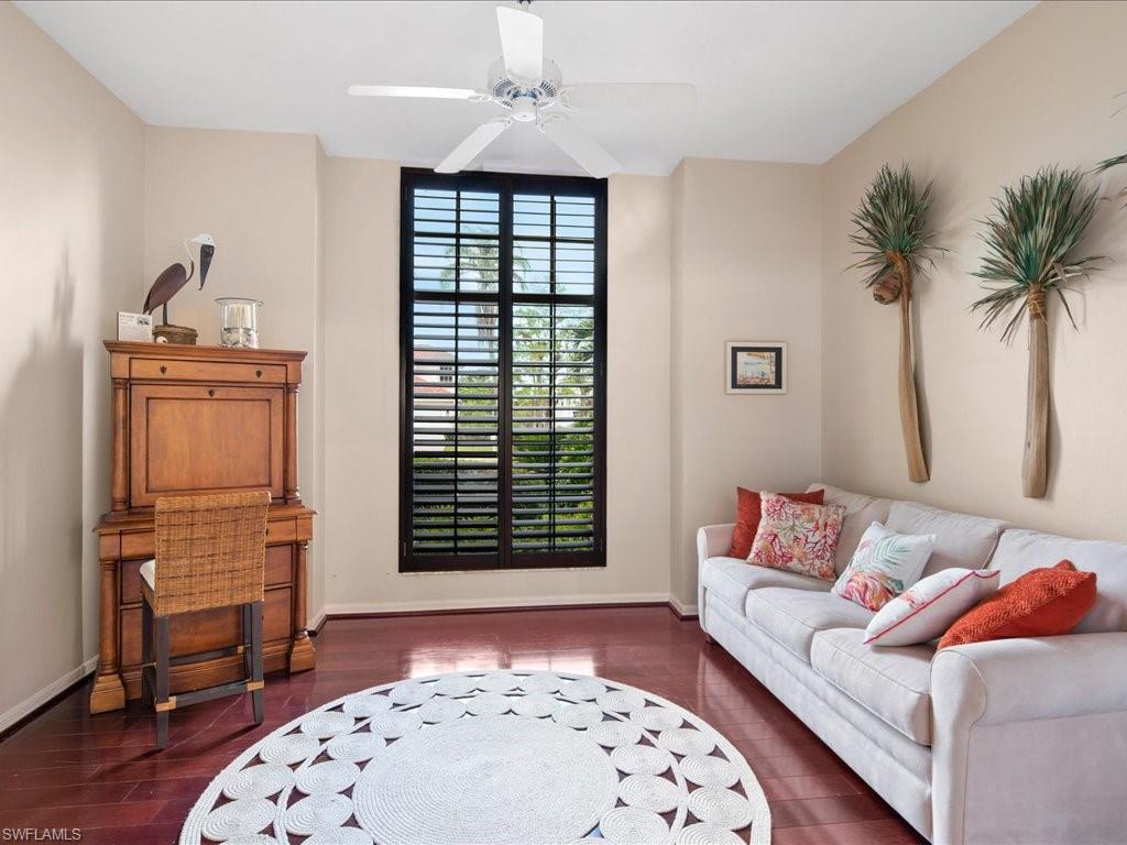 2088 Piccadilly Circus Naples, FL 34112 - Photo 19 of 29 a living room with furniture and a window