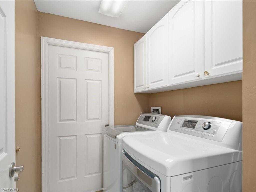 2088 Piccadilly Circus Naples, FL 34112 - Photo 21 of 29 a utility room with dryer and washer