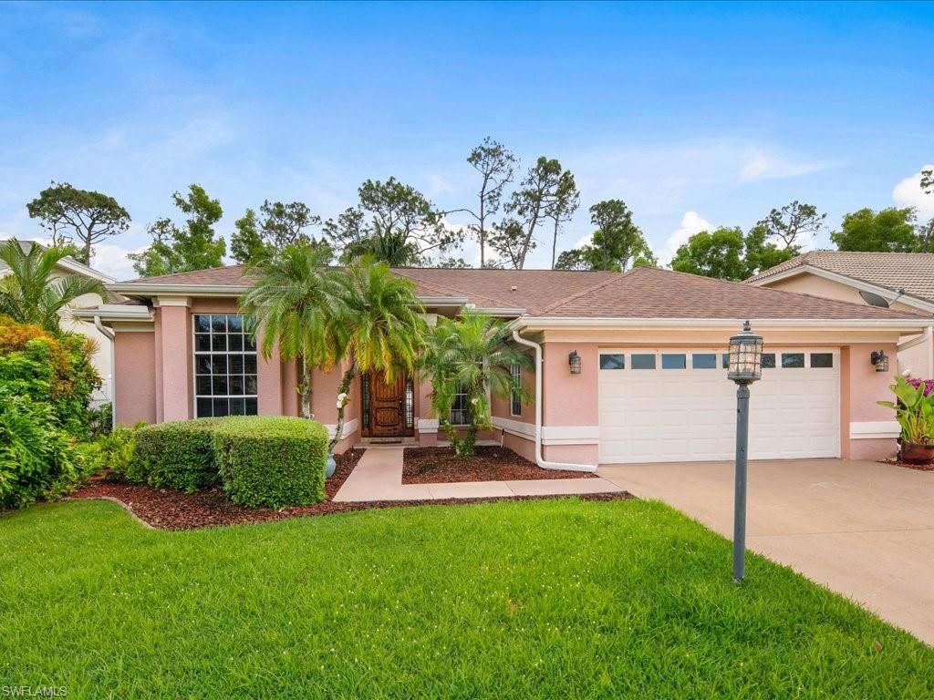 2088 Piccadilly Circus Naples, FL 34112 - Photo 29 of 29 front view of a house with a yard