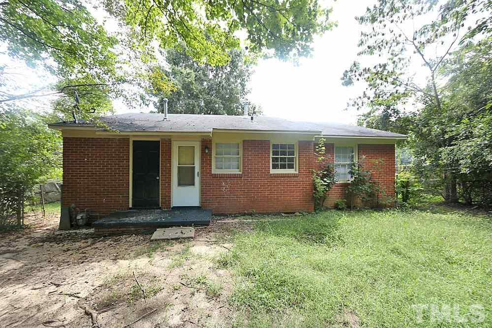1109 North King Charles Road Raleigh, NC 27610 - Photo 13 of 13 a view of a house with a yard
