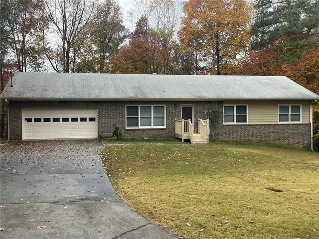 a view of a house with a swimming pool