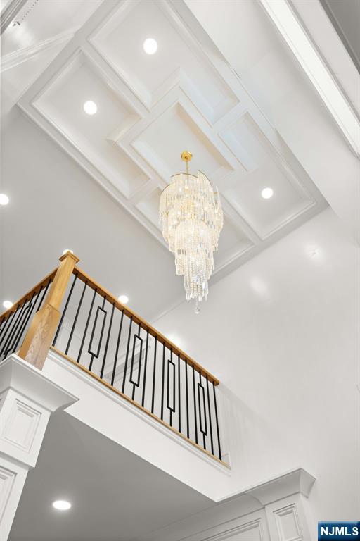 14 Beechwood Road Ho-Ho-Kus, NJ 07423 - Photo 21 of 31 a view of staircase with a chandelier fan