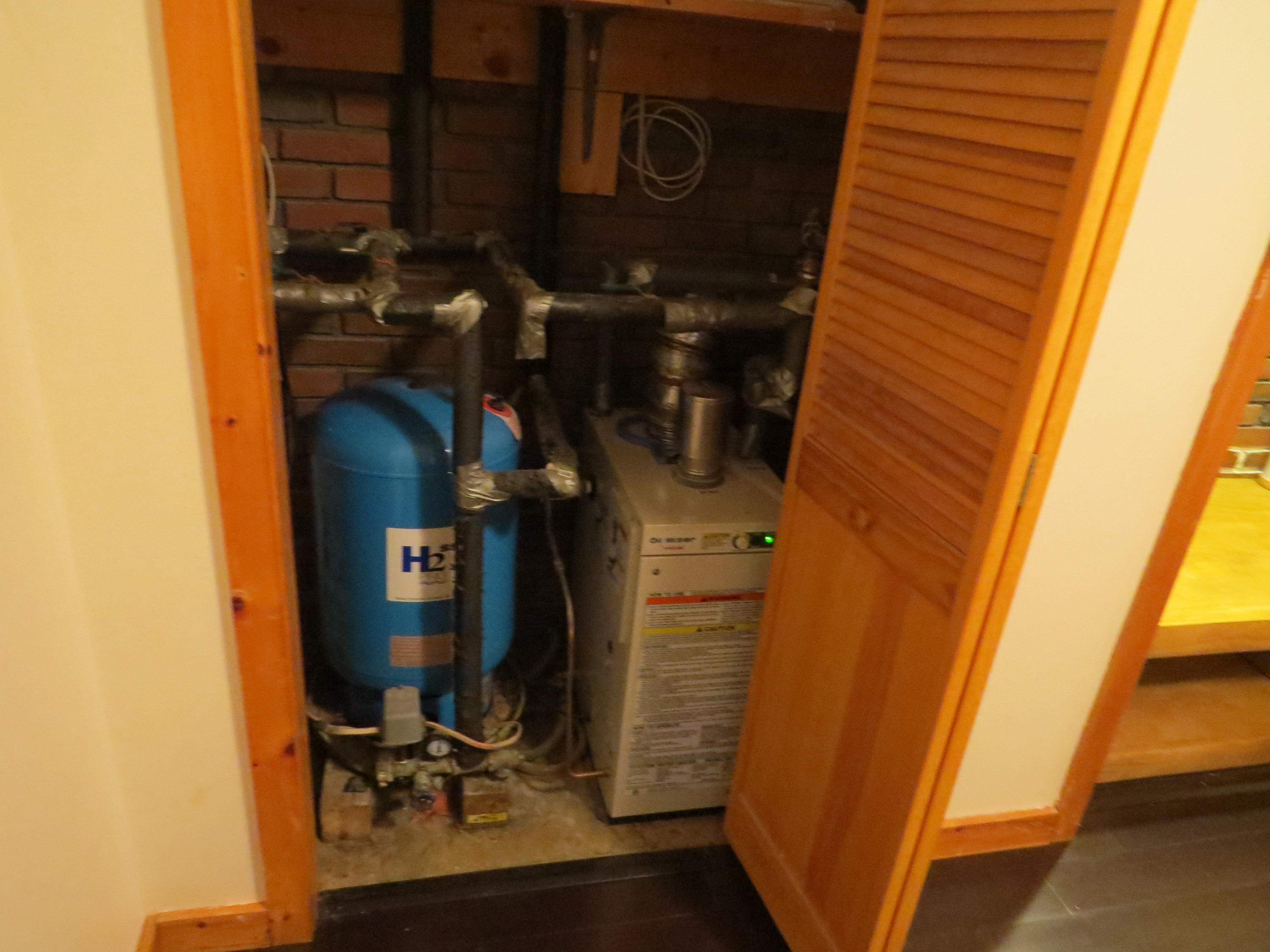 226 Willey Point Road Oakland, ME 04963 - Photo 29 of 62 Expansion tank & on demand water heater.