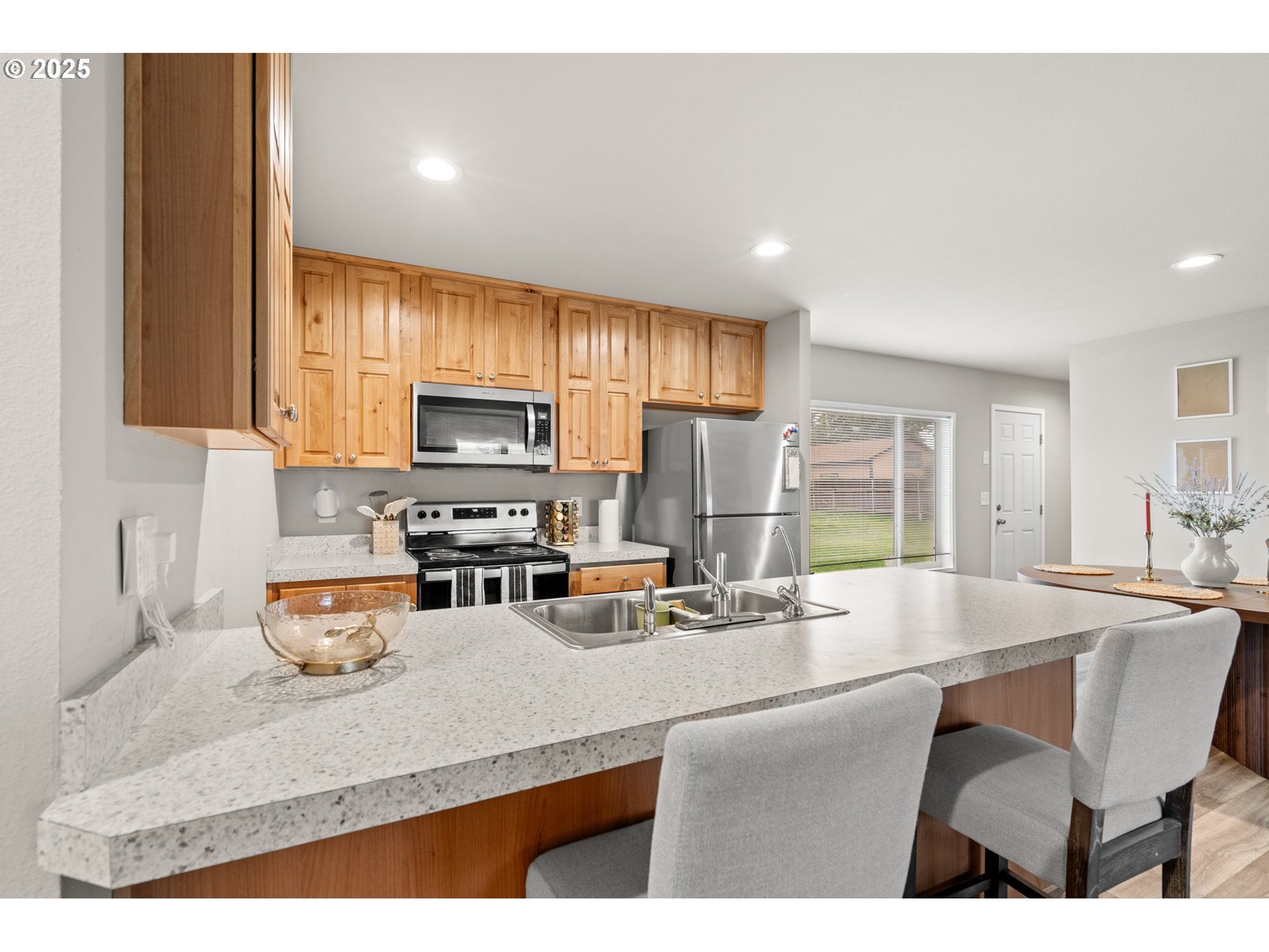 32390 East Punkin Center Road Hermiston, OR 97838 - Photo 5 of 17 a kitchen with a sink appliances and cabinets
