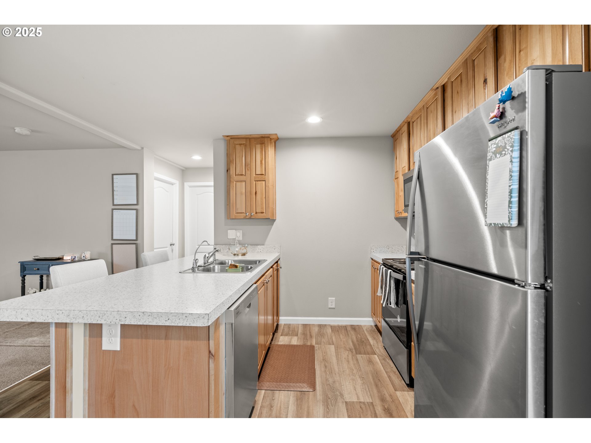 32390 East Punkin Center Road Hermiston, OR 97838 - Photo 6 of 17 a kitchen with refrigerator and car