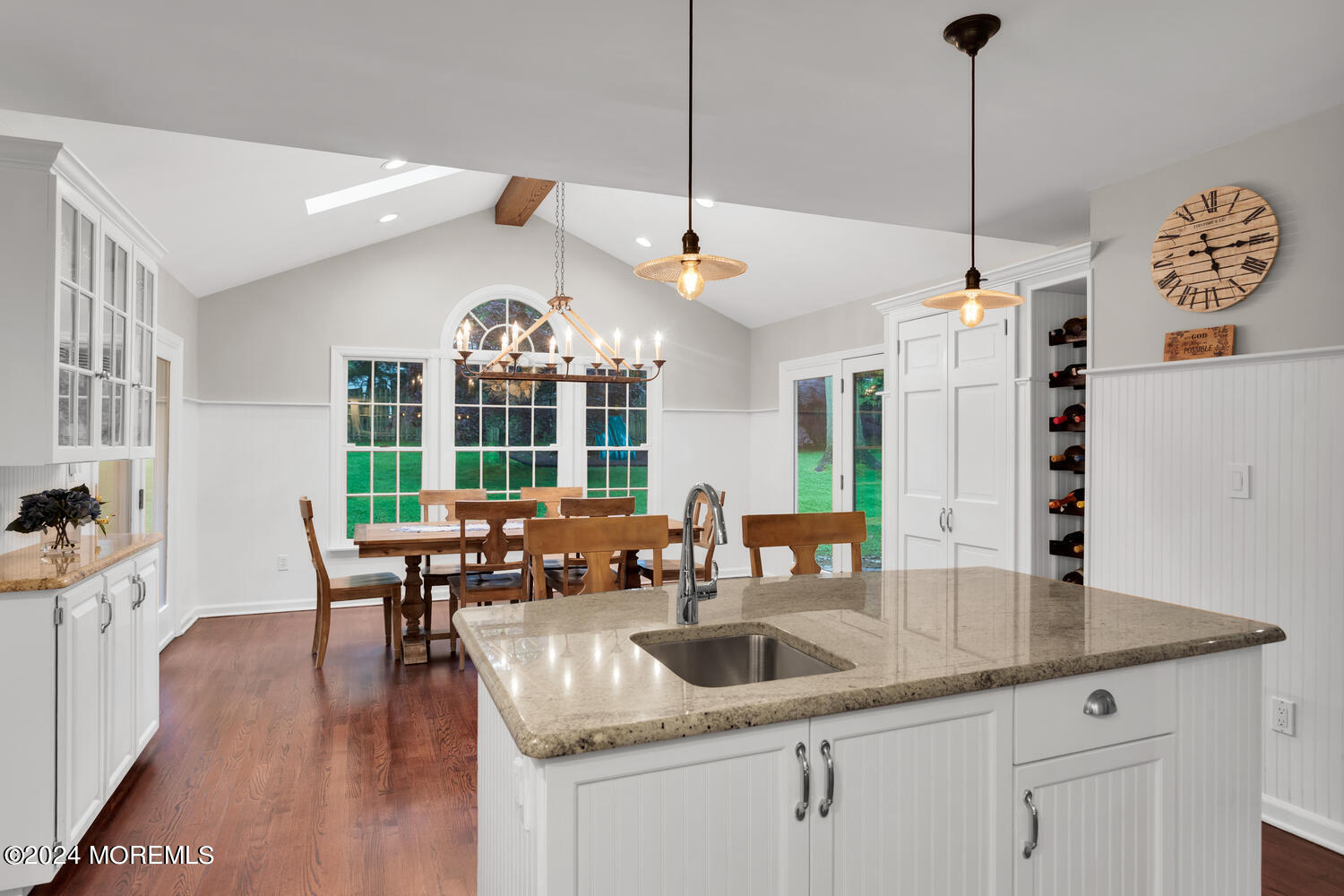 162 Twin Brooks Avenue Middletown, NJ 07748 - Photo 12 of 60 a very nice looking dining room with a large window and chandelier