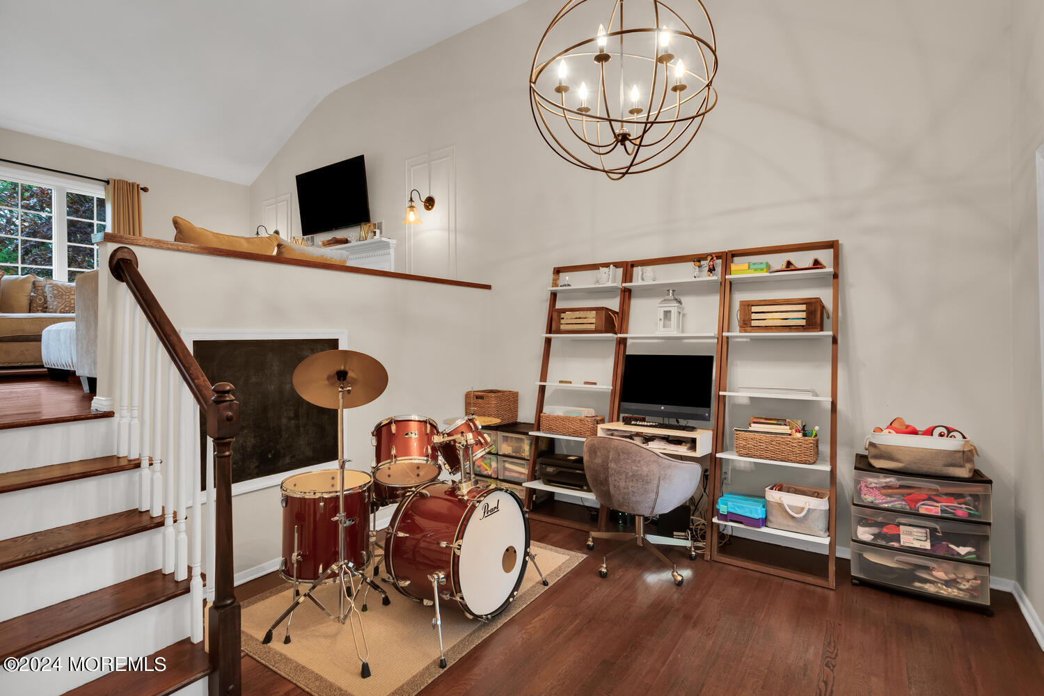 162 Twin Brooks Avenue Middletown, NJ 07748 - Photo 19 of 60 a view of a workspace with furniture and a flat screen tv