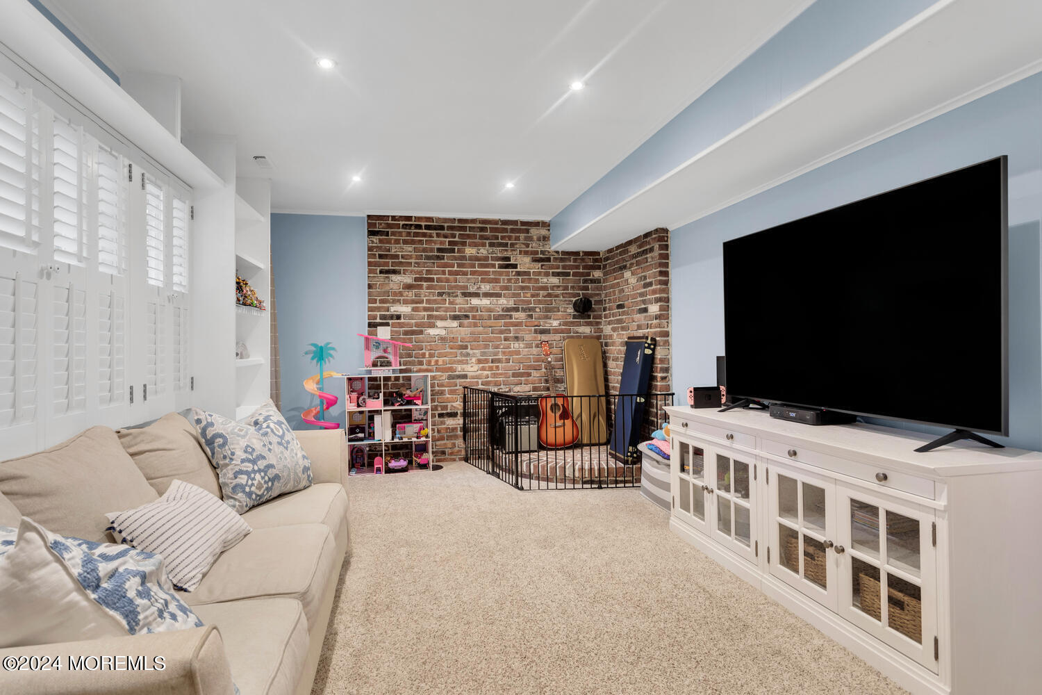 162 Twin Brooks Avenue Middletown, NJ 07748 - Photo 21 of 60 a living room with fireplace furniture and a flat screen tv