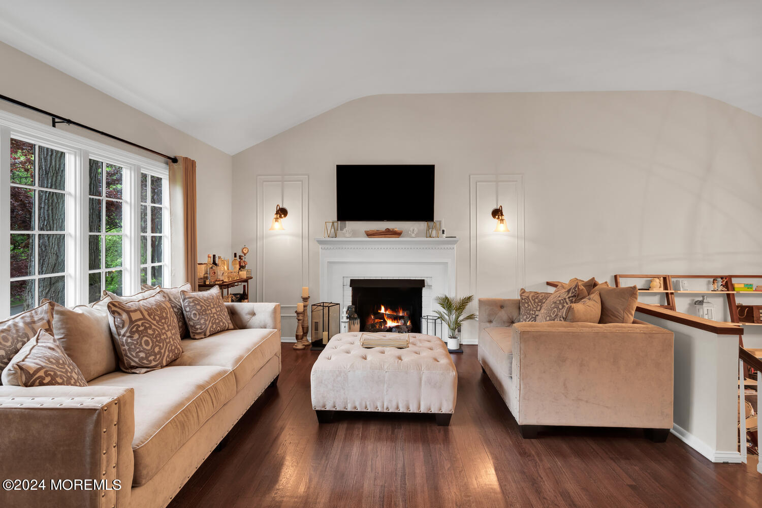 162 Twin Brooks Avenue Middletown, NJ 07748 - Photo 26 of 60 a living room with furniture a flat screen tv and a fireplace