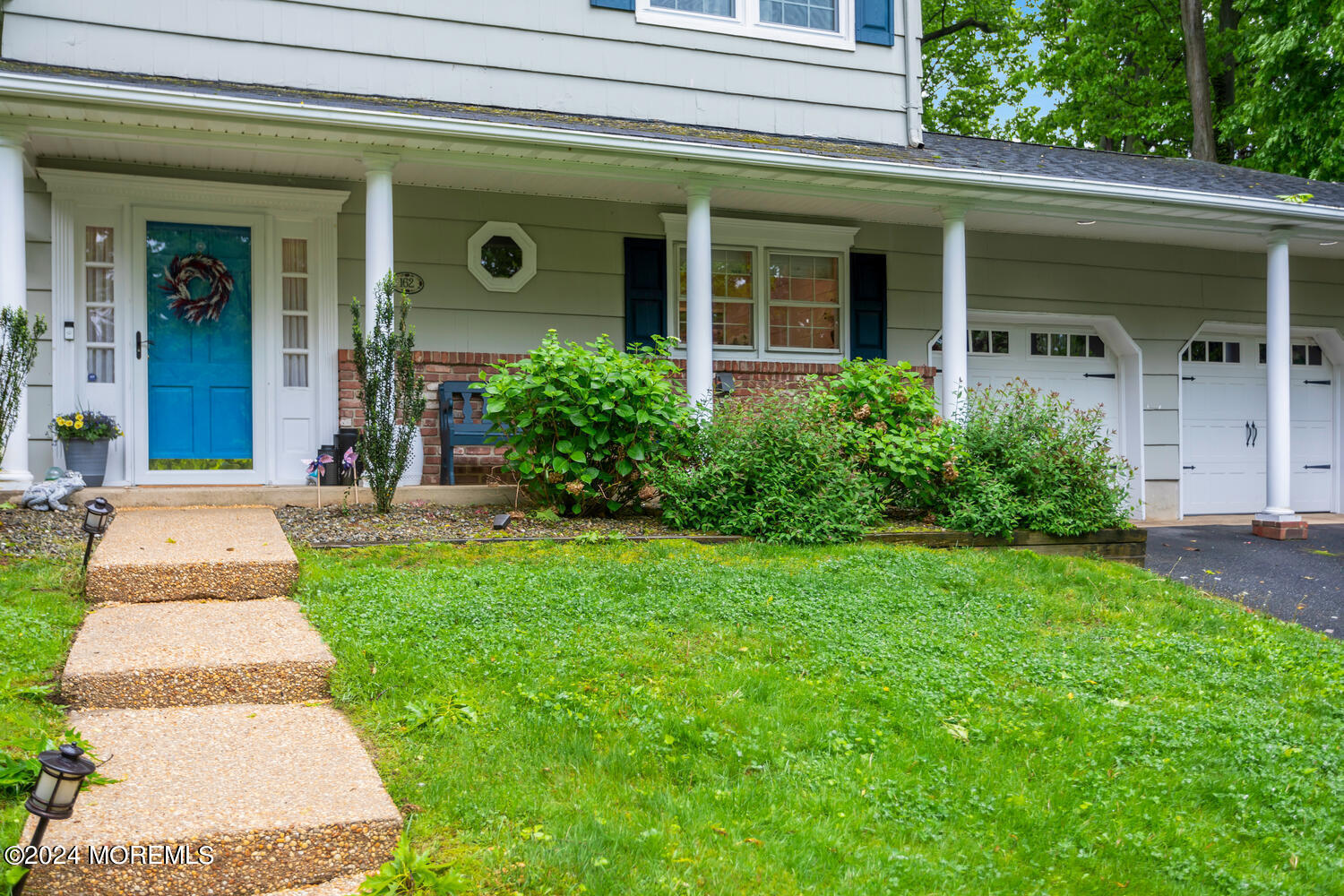 162 Twin Brooks Avenue Middletown, NJ 07748 - Photo 3 of 60 a front view of a house with garden