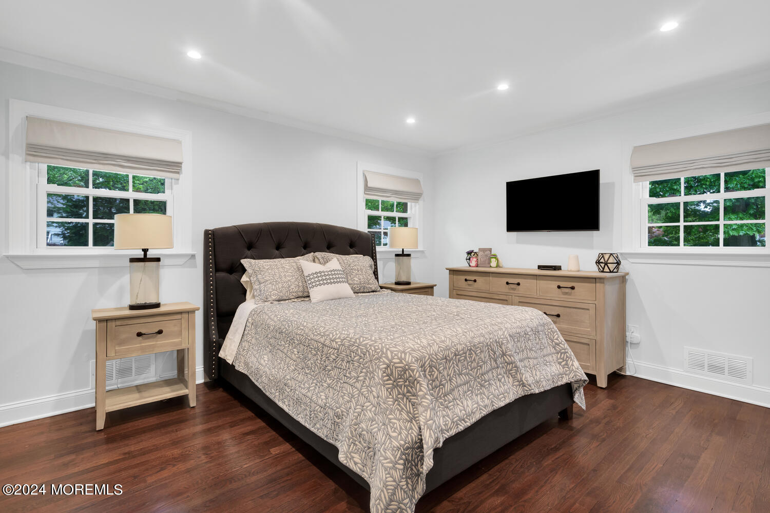 162 Twin Brooks Avenue Middletown, NJ 07748 - Photo 31 of 60 a bedroom with a bed and a flat screen tv